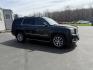 2015 Black /Black GMC Yukon Denali 4WD (1GKS2CKJXFR) with an 6.2L V8 OHV 16V engine, 8-Speed Automatic transmission, located at 11115 Chardon Rd. , Chardon, OH, 44024, (440) 214-9705, 41.580246, -81.241943 - Photo#3