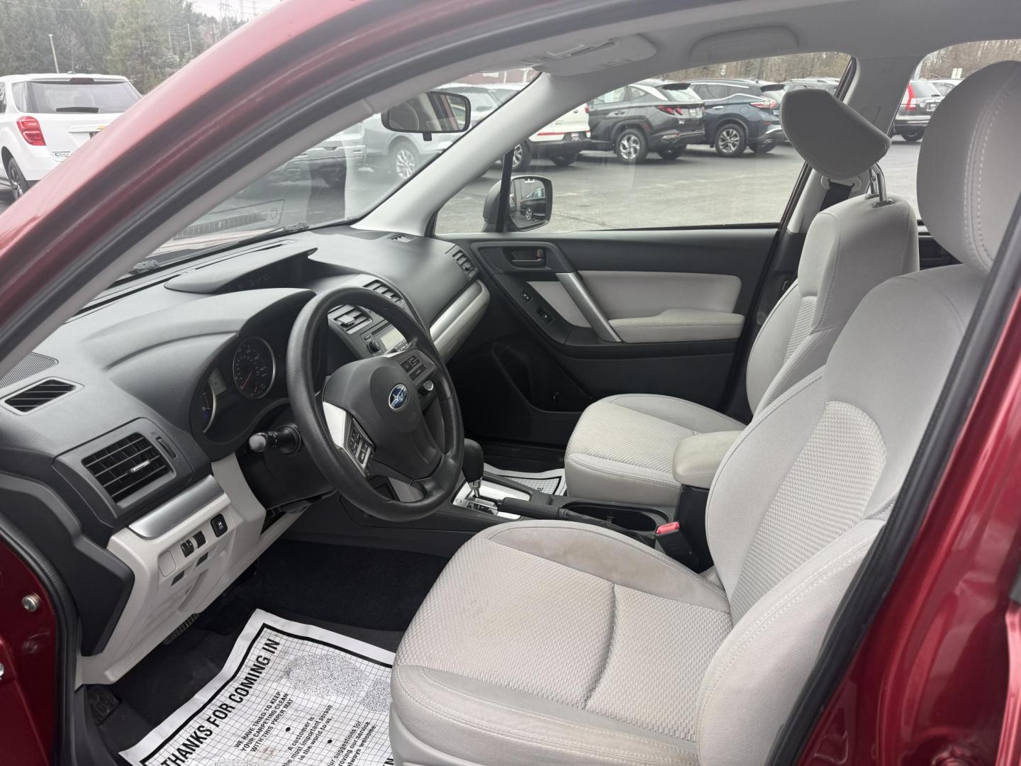 2014 Red /Gray Subaru Forester 2.5i (JF2SJAAC6EH) with an 2.5L H4 DOHC 16V engine, Automatic transmission, located at 11115 Chardon Rd. , Chardon, OH, 44024, (440) 214-9705, 41.580246, -81.241943 - Photo#4
