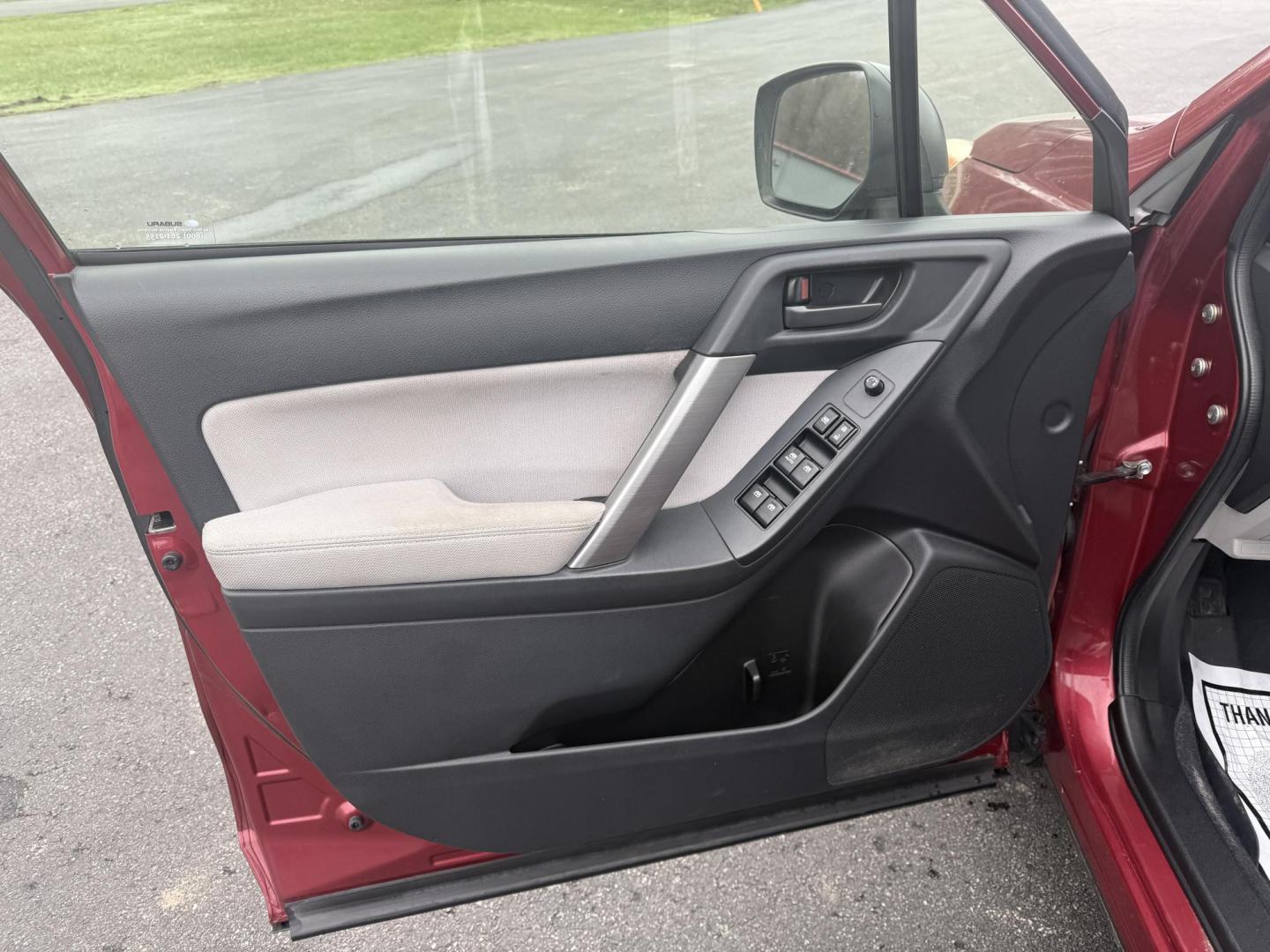 2014 Red /Gray Subaru Forester 2.5i (JF2SJAAC6EH) with an 2.5L H4 DOHC 16V engine, Automatic transmission, located at 11115 Chardon Rd. , Chardon, OH, 44024, (440) 214-9705, 41.580246, -81.241943 - Photo#6