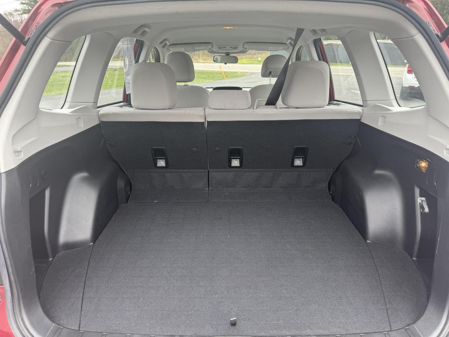 2014 Red /Gray Subaru Forester 2.5i (JF2SJAAC6EH) with an 2.5L H4 DOHC 16V engine, Automatic transmission, located at 11115 Chardon Rd. , Chardon, OH, 44024, (440) 214-9705, 41.580246, -81.241943 - Photo#21