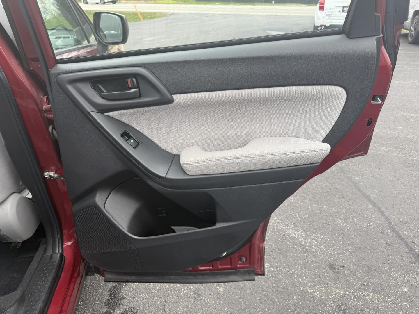 2014 Red /Gray Subaru Forester 2.5i (JF2SJAAC6EH) with an 2.5L H4 DOHC 16V engine, Automatic transmission, located at 11115 Chardon Rd. , Chardon, OH, 44024, (440) 214-9705, 41.580246, -81.241943 - Photo#24