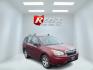 2014 Red /Gray Subaru Forester 2.5i (JF2SJAAC6EH) with an 2.5L H4 DOHC 16V engine, Automatic transmission, located at 11115 Chardon Rd. , Chardon, OH, 44024, (440) 214-9705, 41.580246, -81.241943 - This clean One Owner 2015 Subaru is a do anything go anywhere SUV. Equipped with a 2.5-liter H4 engine that, combined with Subaru's renowned Symmetrical All-Wheel Drive system, provides excellent traction and stability, making it ideal for various driving conditions. Achieving a fuel economy of 31 M - Photo#2