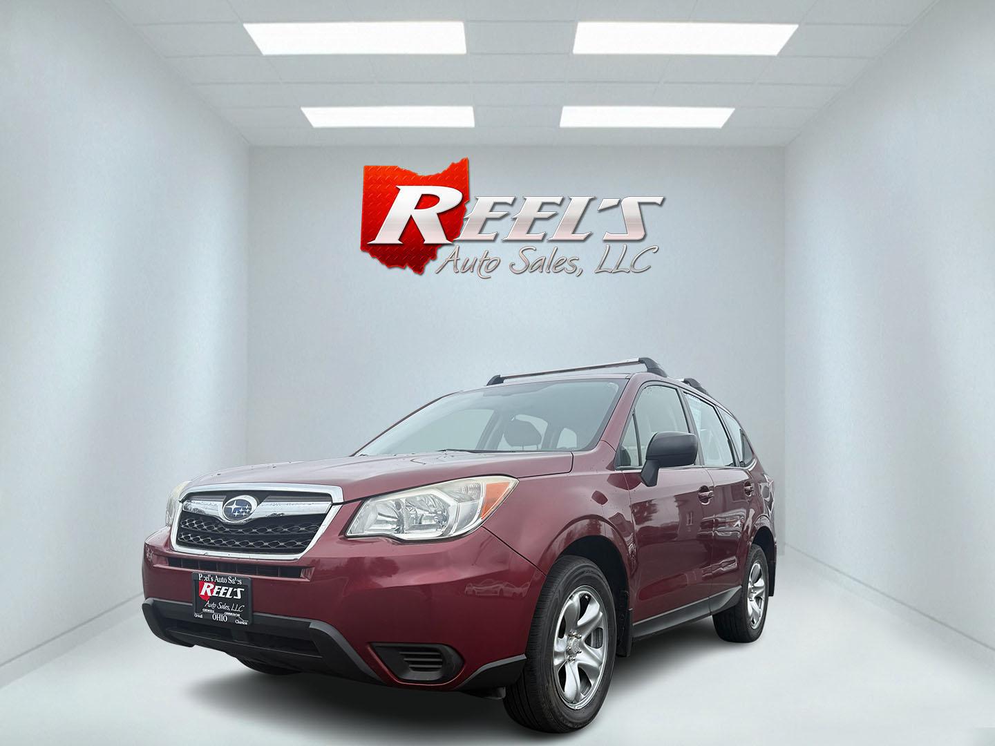 2014 Red /Gray Subaru Forester 2.5i (JF2SJAAC6EH) with an 2.5L H4 DOHC 16V engine, Automatic transmission, located at 11115 Chardon Rd. , Chardon, OH, 44024, (440) 214-9705, 41.580246, -81.241943 - Photo#0
