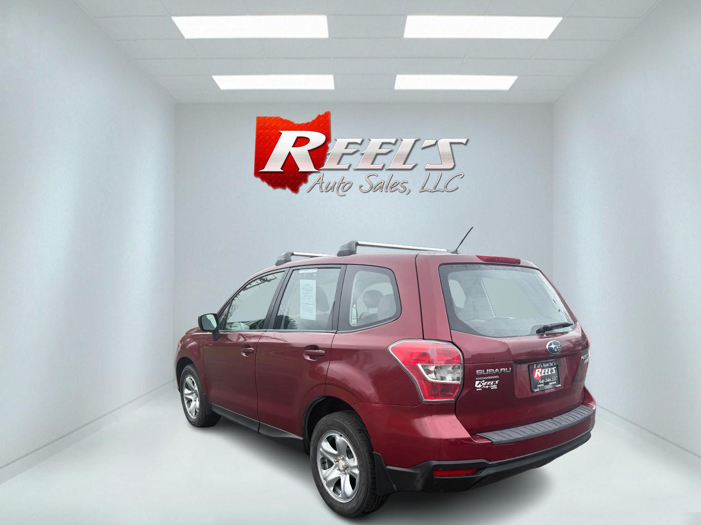 2014 Red /Gray Subaru Forester 2.5i (JF2SJAAC6EH) with an 2.5L H4 DOHC 16V engine, Automatic transmission, located at 11115 Chardon Rd. , Chardon, OH, 44024, (440) 214-9705, 41.580246, -81.241943 - Photo#31