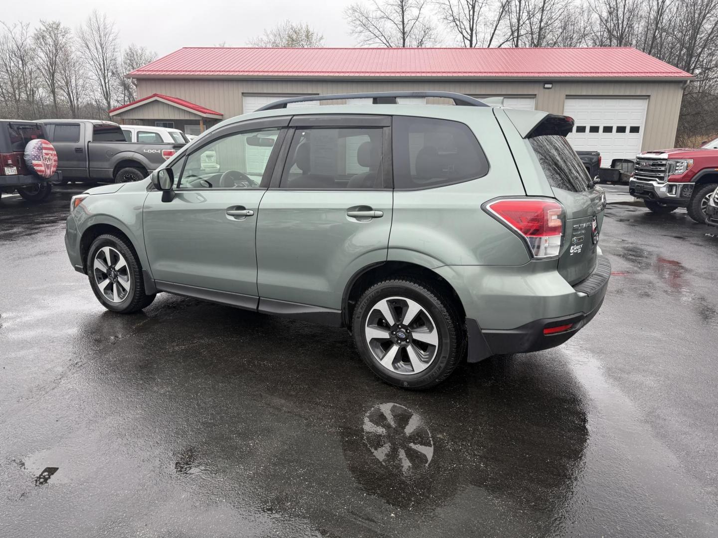 2017 Green /Gray Subaru Forester 2.5i Premium PZEV CVT (JF2SJAEC3HH) with an 2.5L H4 DOHC 16V engine, Automatic transmission, located at 547 E. Main St., Orwell, OH, 44076, (440) 437-5893, 41.535435, -80.847855 - This One Owner Subaru Forester is super fuel efficient and capable. With a 2.5-liter H4 engine and Subaru's Symmetrical All-Wheel Drive system, offering stability and traction. It features comforts like heated front seats, a 7.0-inch touchscreen for infotainment, and single-zone automatic climate co - Photo#10