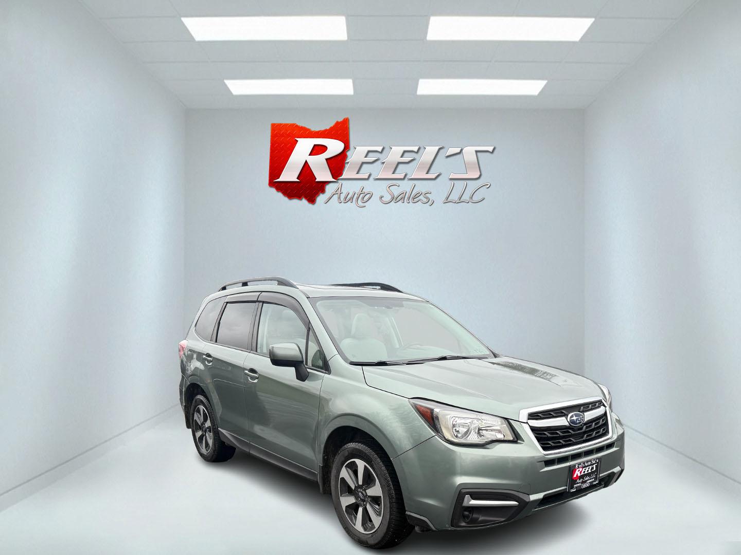 2017 Green /Gray Subaru Forester 2.5i Premium PZEV CVT (JF2SJAEC3HH) with an 2.5L H4 DOHC 16V engine, Automatic transmission, located at 547 E. Main St., Orwell, OH, 44076, (440) 437-5893, 41.535435, -80.847855 - Photo#1