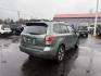 2017 Green /Gray Subaru Forester 2.5i Premium PZEV CVT (JF2SJAEC3HH) with an 2.5L H4 DOHC 16V engine, Automatic transmission, located at 547 E. Main St., Orwell, OH, 44076, (440) 437-5893, 41.535435, -80.847855 - This One Owner Subaru Forester is super fuel efficient and capable. With a 2.5-liter H4 engine and Subaru's Symmetrical All-Wheel Drive system, offering stability and traction. It features comforts like heated front seats, a 7.0-inch touchscreen for infotainment, and single-zone automatic climate co - Photo#7