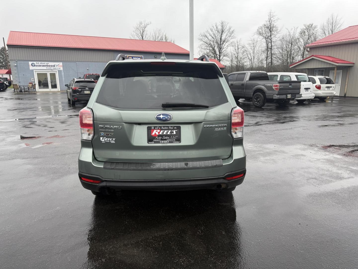 2017 Green /Gray Subaru Forester 2.5i Premium PZEV CVT (JF2SJAEC3HH) with an 2.5L H4 DOHC 16V engine, Automatic transmission, located at 547 E. Main St., Orwell, OH, 44076, (440) 437-5893, 41.535435, -80.847855 - This One Owner Subaru Forester is super fuel efficient and capable. With a 2.5-liter H4 engine and Subaru's Symmetrical All-Wheel Drive system, offering stability and traction. It features comforts like heated front seats, a 7.0-inch touchscreen for infotainment, and single-zone automatic climate co - Photo#8