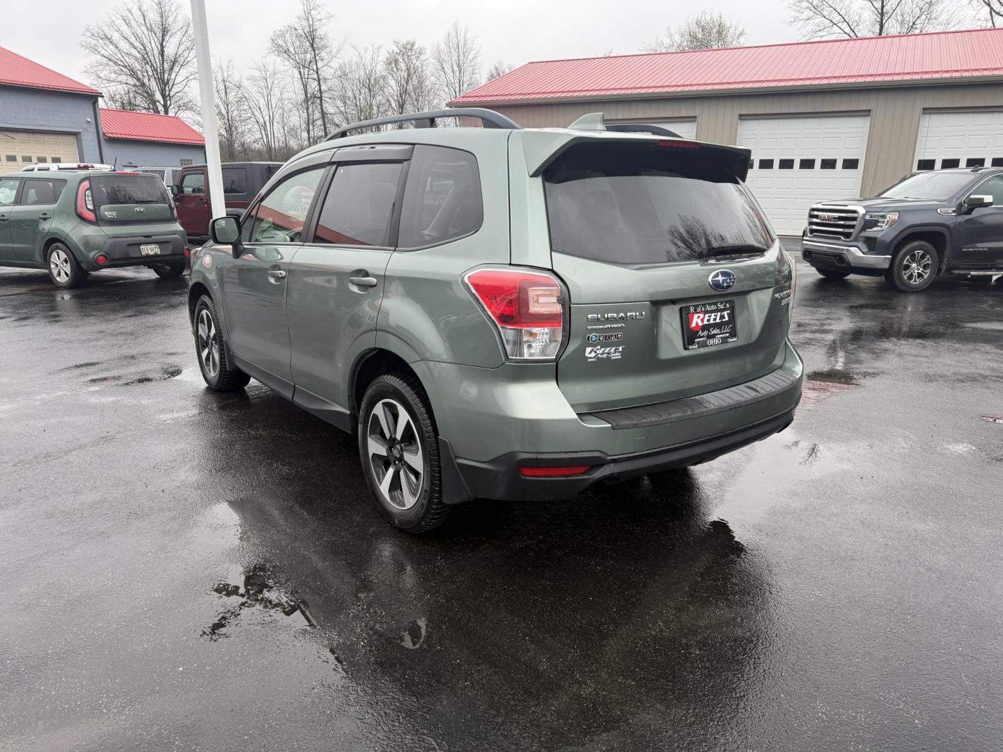 2017 Green /Gray Subaru Forester 2.5i Premium PZEV CVT (JF2SJAEC3HH) with an 2.5L H4 DOHC 16V engine, Automatic transmission, located at 547 E. Main St., Orwell, OH, 44076, (440) 437-5893, 41.535435, -80.847855 - This One Owner Subaru Forester is super fuel efficient and capable. With a 2.5-liter H4 engine and Subaru's Symmetrical All-Wheel Drive system, offering stability and traction. It features comforts like heated front seats, a 7.0-inch touchscreen for infotainment, and single-zone automatic climate co - Photo#9