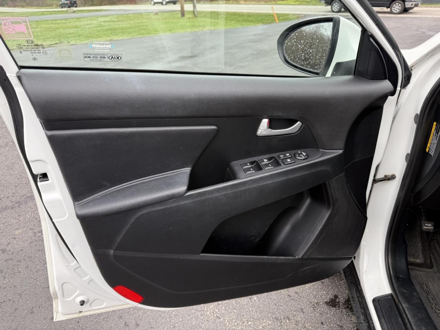 2015 White /Black Kia Sportage LX AWD (KNDPBCAC2F7) with an 2.4L I4 DOHC 16V engine, 6-Speed Automatic transmission, located at 11115 Chardon Rd. , Chardon, OH, 44024, (440) 214-9705, 41.580246, -81.241943 - This One Owner 2015 Kia Sportage LX AWD is a compact SUV equipped with a 2.4-liter inline-four GDI engine paired with a 6-speed automatic transmission. Despite being from 2015, this model offers modern amenities such as ECO driving mode for enhanced fuel efficiency and compatibility with Apple Carpl - Photo#9