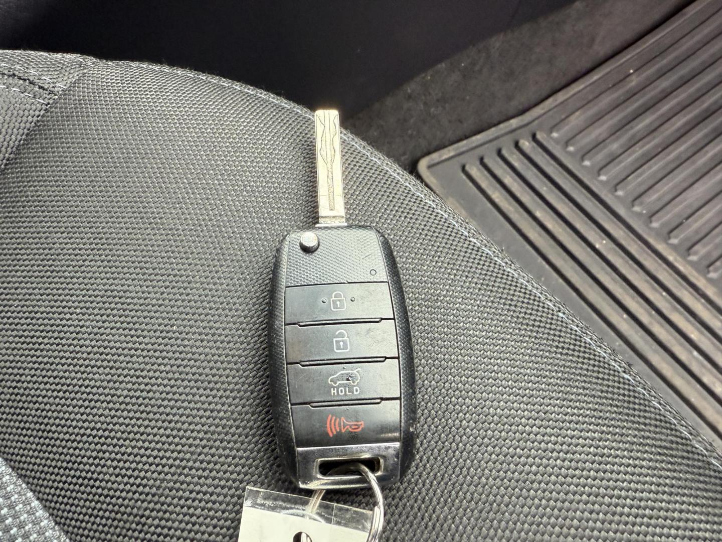 2015 White /Black Kia Sportage LX AWD (KNDPBCAC2F7) with an 2.4L I4 DOHC 16V engine, 6-Speed Automatic transmission, located at 11115 Chardon Rd. , Chardon, OH, 44024, (440) 214-9705, 41.580246, -81.241943 - This One Owner 2015 Kia Sportage LX AWD is a compact SUV equipped with a 2.4-liter inline-four GDI engine paired with a 6-speed automatic transmission. Despite being from 2015, this model offers modern amenities such as ECO driving mode for enhanced fuel efficiency and compatibility with Apple Carpl - Photo#31