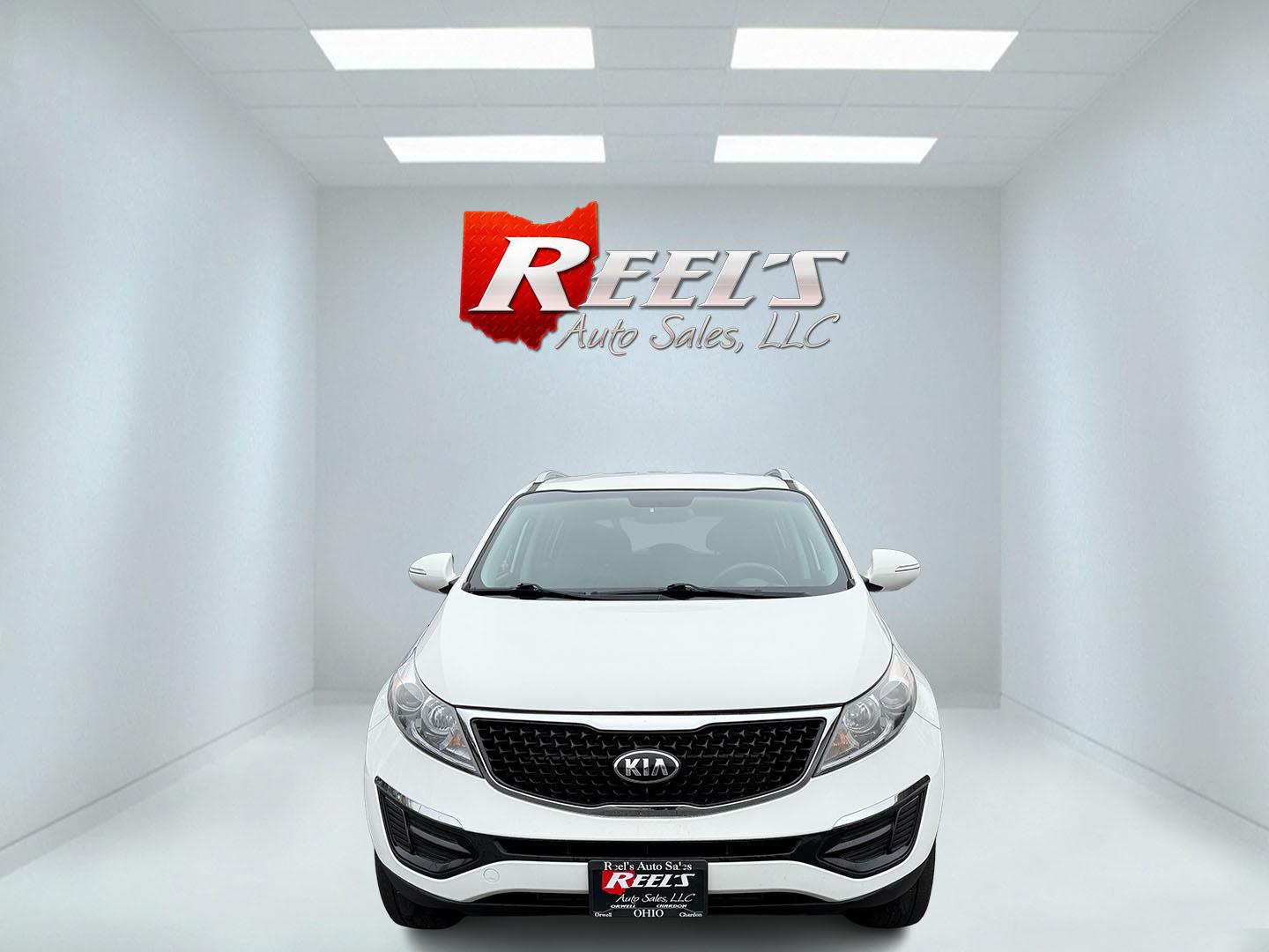 2015 White /Black Kia Sportage LX AWD (KNDPBCAC2F7) with an 2.4L I4 DOHC 16V engine, 6-Speed Automatic transmission, located at 11115 Chardon Rd. , Chardon, OH, 44024, (440) 214-9705, 41.580246, -81.241943 - This One Owner 2015 Kia Sportage LX AWD is a compact SUV equipped with a 2.4-liter inline-four GDI engine paired with a 6-speed automatic transmission. Despite being from 2015, this model offers modern amenities such as ECO driving mode for enhanced fuel efficiency and compatibility with Apple Carpl - Photo#1