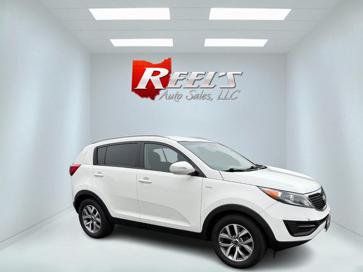 2015 White /Black Kia Sportage LX AWD (KNDPBCAC2F7) with an 2.4L I4 DOHC 16V engine, 6-Speed Automatic transmission, located at 11115 Chardon Rd. , Chardon, OH, 44024, (440) 214-9705, 41.580246, -81.241943 - This One Owner 2015 Kia Sportage LX AWD is a compact SUV equipped with a 2.4-liter inline-four GDI engine paired with a 6-speed automatic transmission. Despite being from 2015, this model offers modern amenities such as ECO driving mode for enhanced fuel efficiency and compatibility with Apple Carpl - Photo#12