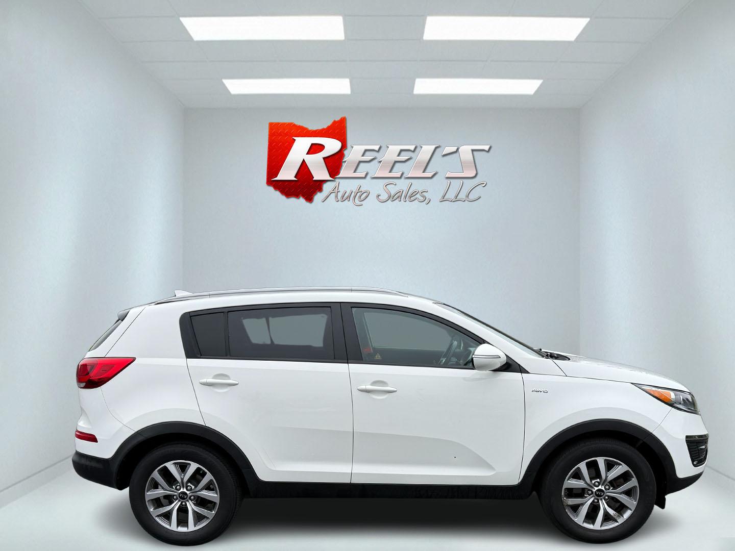 2015 White /Black Kia Sportage LX AWD (KNDPBCAC2F7) with an 2.4L I4 DOHC 16V engine, 6-Speed Automatic transmission, located at 11115 Chardon Rd. , Chardon, OH, 44024, (440) 214-9705, 41.580246, -81.241943 - This One Owner 2015 Kia Sportage LX AWD is a compact SUV equipped with a 2.4-liter inline-four GDI engine paired with a 6-speed automatic transmission. Despite being from 2015, this model offers modern amenities such as ECO driving mode for enhanced fuel efficiency and compatibility with Apple Carpl - Photo#13