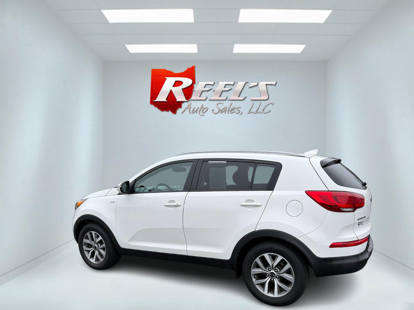2015 White /Black Kia Sportage LX AWD (KNDPBCAC2F7) with an 2.4L I4 DOHC 16V engine, 6-Speed Automatic transmission, located at 11115 Chardon Rd. , Chardon, OH, 44024, (440) 214-9705, 41.580246, -81.241943 - This One Owner 2015 Kia Sportage LX AWD is a compact SUV equipped with a 2.4-liter inline-four GDI engine paired with a 6-speed automatic transmission. Despite being from 2015, this model offers modern amenities such as ECO driving mode for enhanced fuel efficiency and compatibility with Apple Carpl - Photo#35