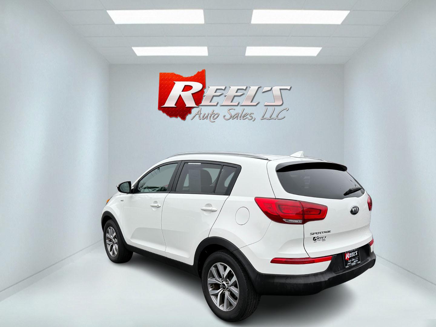2015 White /Black Kia Sportage LX AWD (KNDPBCAC2F7) with an 2.4L I4 DOHC 16V engine, 6-Speed Automatic transmission, located at 11115 Chardon Rd. , Chardon, OH, 44024, (440) 214-9705, 41.580246, -81.241943 - This One Owner 2015 Kia Sportage LX AWD is a compact SUV equipped with a 2.4-liter inline-four GDI engine paired with a 6-speed automatic transmission. Despite being from 2015, this model offers modern amenities such as ECO driving mode for enhanced fuel efficiency and compatibility with Apple Carpl - Photo#34
