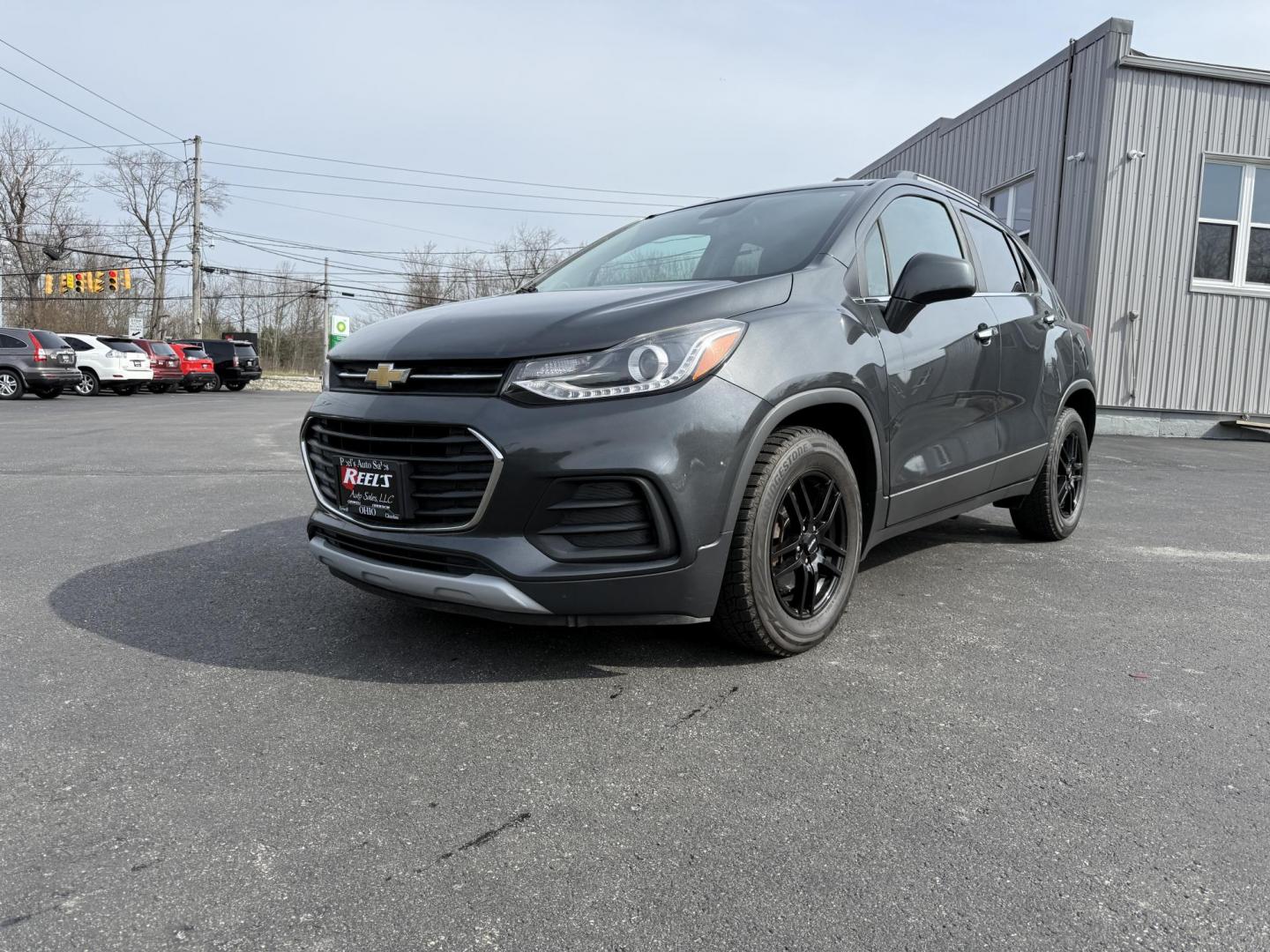 2017 Gray /Black Chevrolet Trax LT FWD (3GNCJLSB8HL) with an 1.4L I4 DOHC 16V Turbo engine, 6A transmission, located at 11115 Chardon Rd. , Chardon, OH, 44024, (440) 214-9705, 41.580246, -81.241943 - This One Owner 2017 Chevrolet Trax is a fuel efficient low miles SUV. Equipped with a 1.4-liter I4 turbocharged EcoTec engine and a 6-speed automatic transmission, providing a balance of efficiency and performance. Notable features include a power driver's seat, remote start for added convenience, a - Photo#0