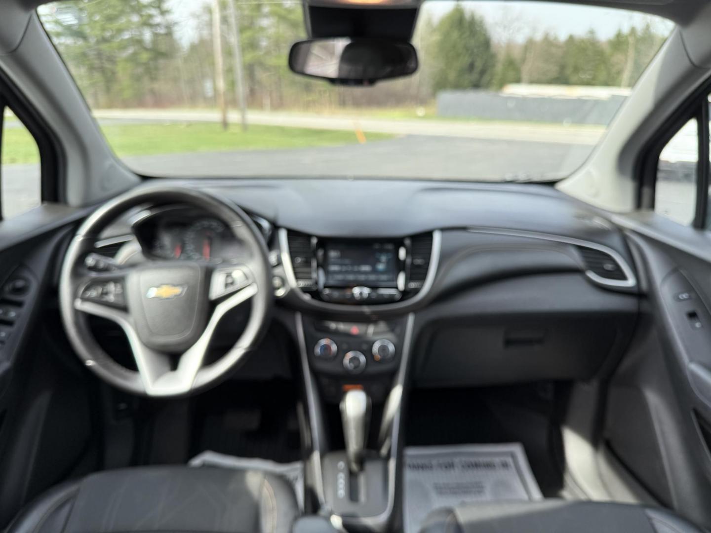 2017 Gray /Black Chevrolet Trax LT FWD (3GNCJLSB8HL) with an 1.4L I4 DOHC 16V Turbo engine, 6A transmission, located at 11115 Chardon Rd. , Chardon, OH, 44024, (440) 214-9705, 41.580246, -81.241943 - This One Owner 2017 Chevrolet Trax is a fuel efficient low miles SUV. Equipped with a 1.4-liter I4 turbocharged EcoTec engine and a 6-speed automatic transmission, providing a balance of efficiency and performance. Notable features include a power driver's seat, remote start for added convenience, a - Photo#28
