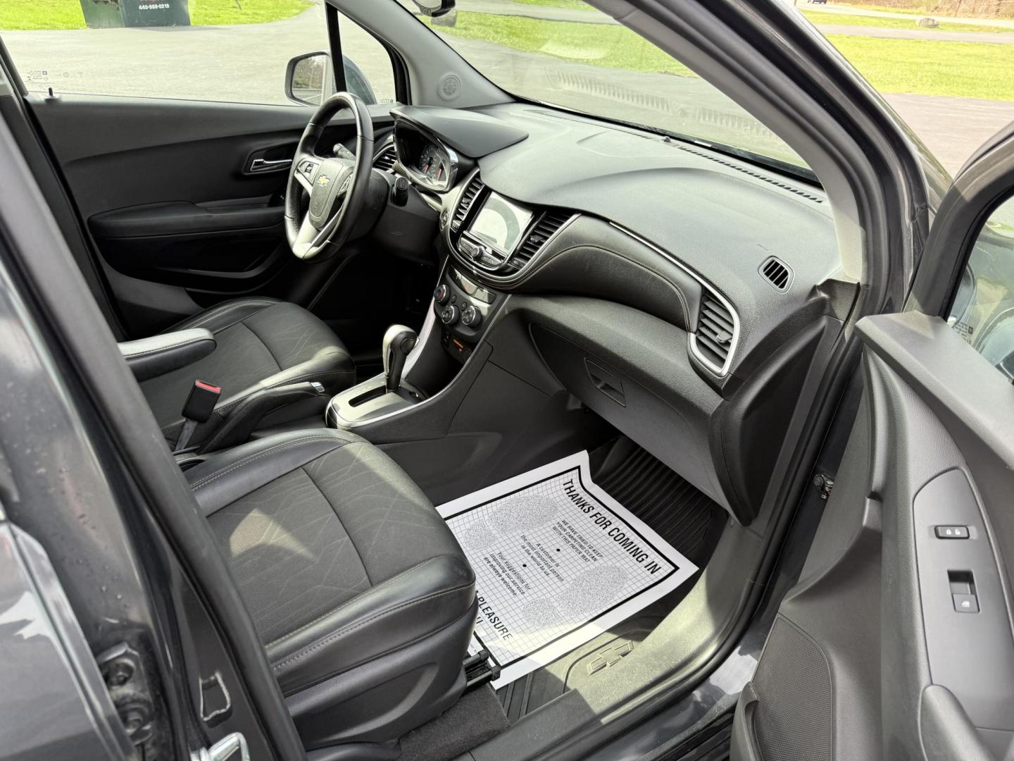 2017 Gray /Black Chevrolet Trax LT FWD (3GNCJLSB8HL) with an 1.4L I4 DOHC 16V Turbo engine, 6A transmission, located at 11115 Chardon Rd. , Chardon, OH, 44024, (440) 214-9705, 41.580246, -81.241943 - This One Owner 2017 Chevrolet Trax is a fuel efficient low miles SUV. Equipped with a 1.4-liter I4 turbocharged EcoTec engine and a 6-speed automatic transmission, providing a balance of efficiency and performance. Notable features include a power driver's seat, remote start for added convenience, a - Photo#34