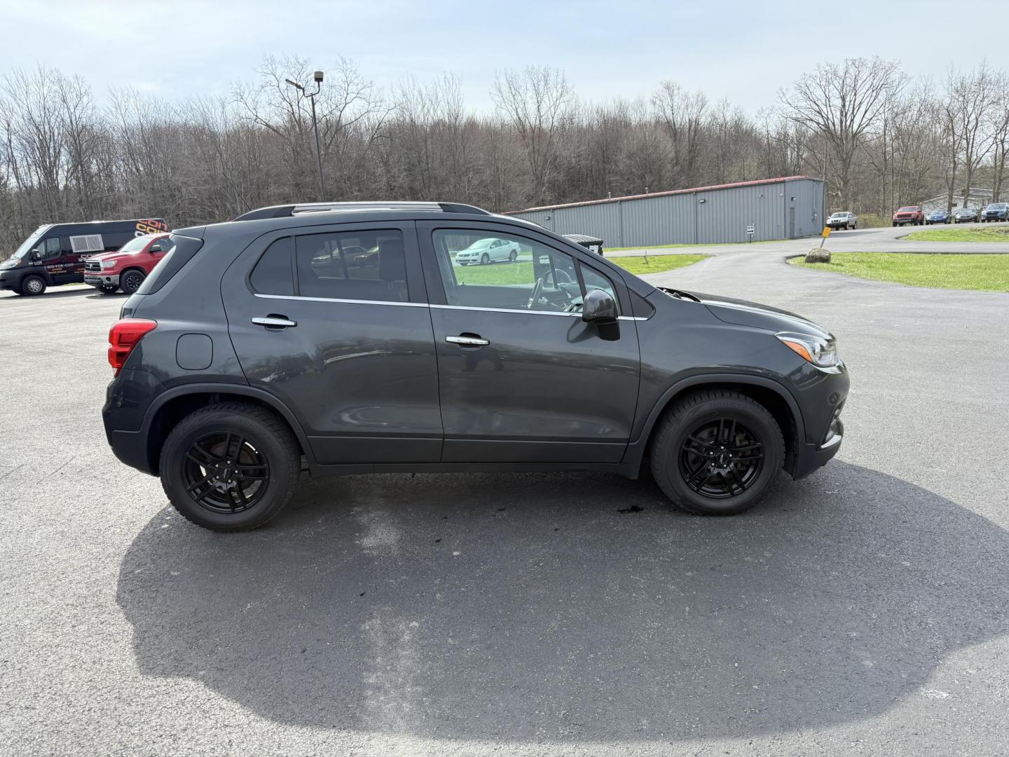 2017 Gray /Black Chevrolet Trax LT FWD (3GNCJLSB8HL) with an 1.4L I4 DOHC 16V Turbo engine, 6A transmission, located at 11115 Chardon Rd. , Chardon, OH, 44024, (440) 214-9705, 41.580246, -81.241943 - This One Owner 2017 Chevrolet Trax is a fuel efficient low miles SUV. Equipped with a 1.4-liter I4 turbocharged EcoTec engine and a 6-speed automatic transmission, providing a balance of efficiency and performance. Notable features include a power driver's seat, remote start for added convenience, a - Photo#4