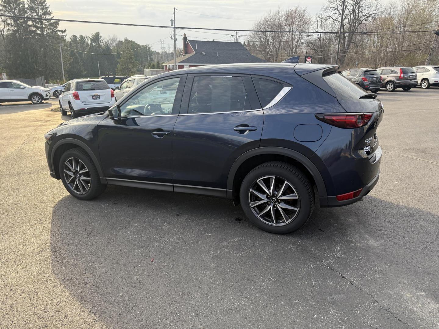 2018 Blue /Black Mazda CX-5 Grand Touring AWD (JM3KFBDM0J0) with an 2.5L I4 DOHC 16V engine, 6A transmission, located at 11115 Chardon Rd. , Chardon, OH, 44024, (440) 214-9705, 41.580246, -81.241943 - Photo#10