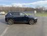 2018 Blue /Black Mazda CX-5 Grand Touring AWD (JM3KFBDM0J0) with an 2.5L I4 DOHC 16V engine, 6A transmission, located at 11115 Chardon Rd. , Chardon, OH, 44024, (440) 214-9705, 41.580246, -81.241943 - Photo#5