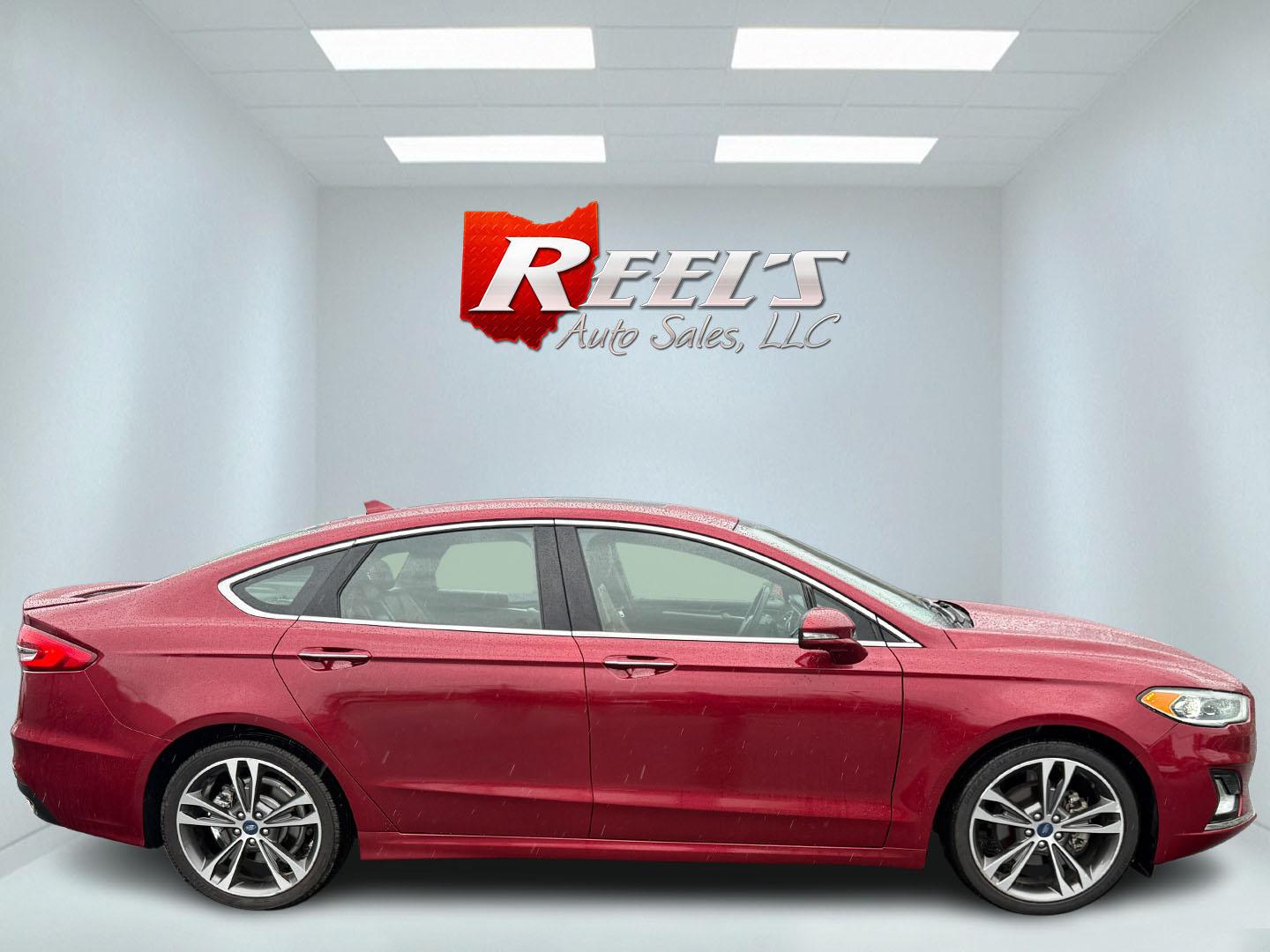 2019 Red /Brown Ford Fusion Titanium AWD (3FA6P0D91KR) with an 2.0L I4 DOHC 16V Turbo engine, 6A transmission, located at 11115 Chardon Rd. , Chardon, OH, 44024, (440) 214-9705, 41.580246, -81.241943 - This Ford Fusion is out of Florida and looks and drives like a dream. Its turbocharged 2.0L I4 engine, 6-speed automatic transmission, and all-wheel drive combine for confident handling. Inside, you'll find a luxurious leather interior with heated and cooled front seats, an advanced 12-speaker Sony - Photo#11