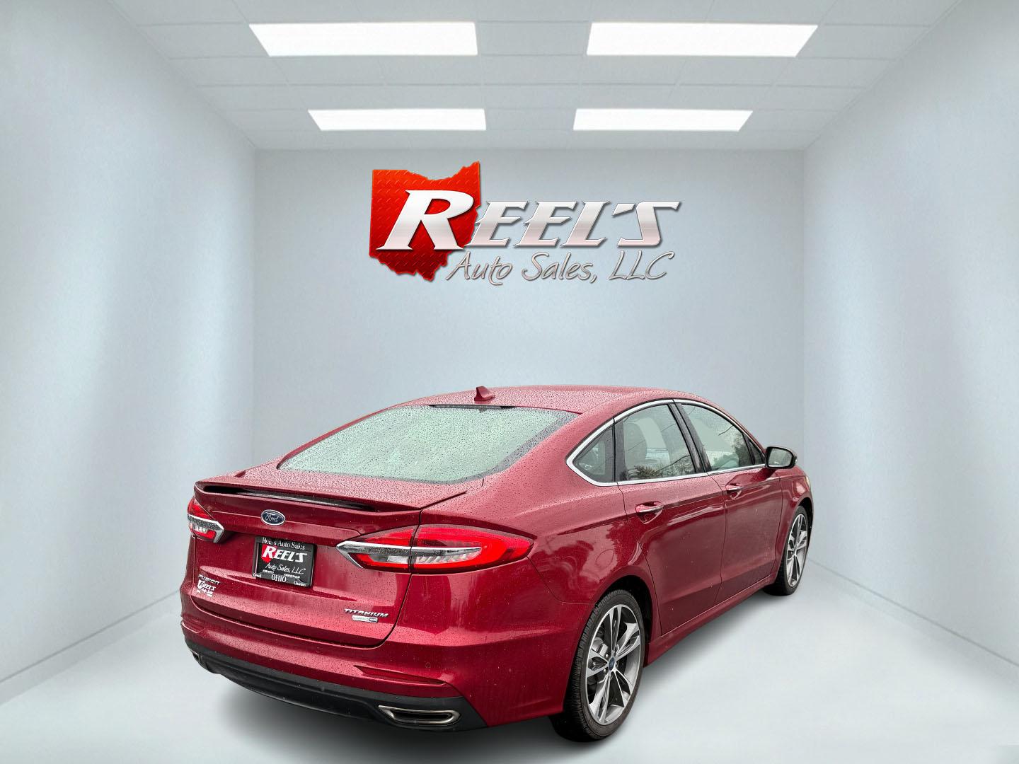 2019 Red /Brown Ford Fusion Titanium AWD (3FA6P0D91KR) with an 2.0L I4 DOHC 16V Turbo engine, 6A transmission, located at 11115 Chardon Rd. , Chardon, OH, 44024, (440) 214-9705, 41.580246, -81.241943 - This Ford Fusion is out of Florida and looks and drives like a dream. Its turbocharged 2.0L I4 engine, 6-speed automatic transmission, and all-wheel drive combine for confident handling. Inside, you'll find a luxurious leather interior with heated and cooled front seats, an advanced 12-speaker Sony - Photo#14
