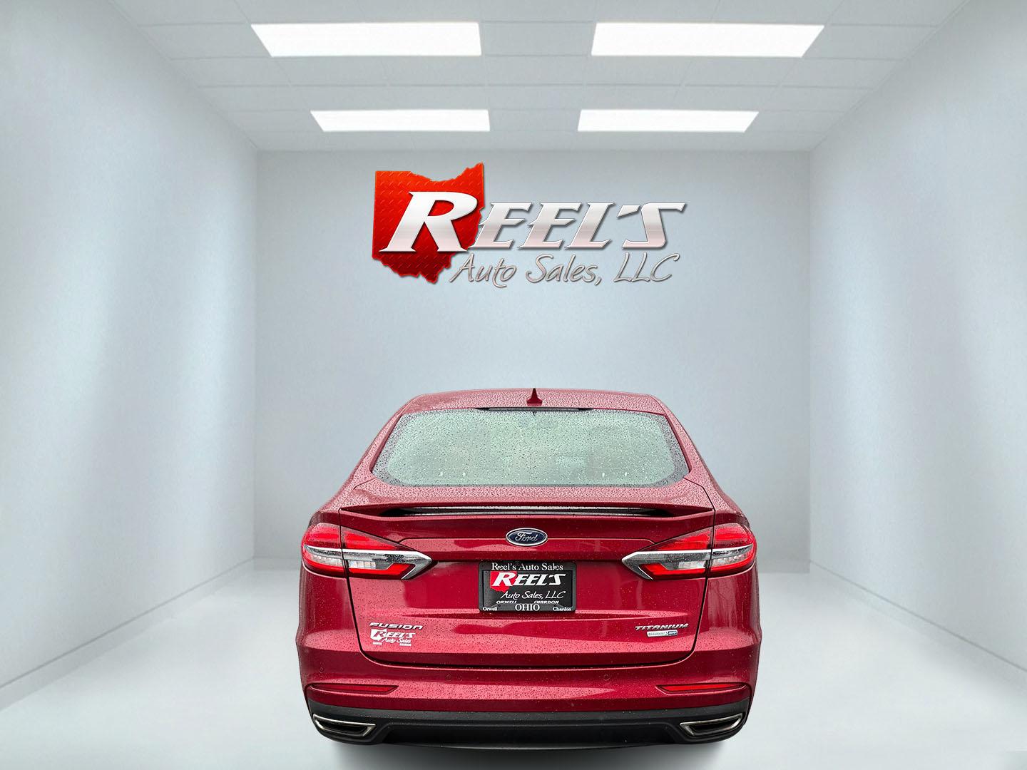 2019 Red /Brown Ford Fusion Titanium AWD (3FA6P0D91KR) with an 2.0L I4 DOHC 16V Turbo engine, 6A transmission, located at 11115 Chardon Rd. , Chardon, OH, 44024, (440) 214-9705, 41.580246, -81.241943 - This Ford Fusion is out of Florida and looks and drives like a dream. Its turbocharged 2.0L I4 engine, 6-speed automatic transmission, and all-wheel drive combine for confident handling. Inside, you'll find a luxurious leather interior with heated and cooled front seats, an advanced 12-speaker Sony - Photo#15