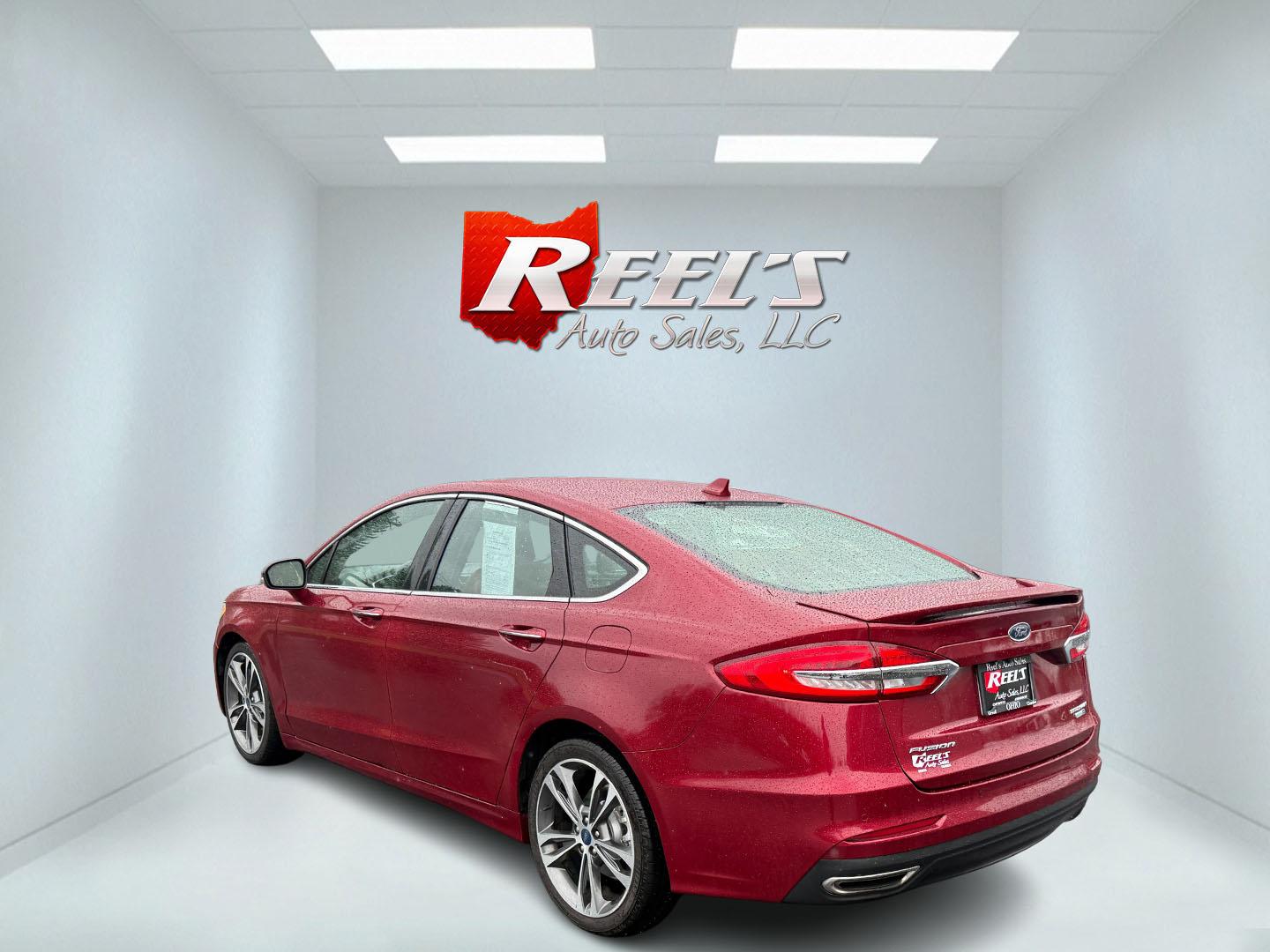2019 Red /Brown Ford Fusion Titanium AWD (3FA6P0D91KR) with an 2.0L I4 DOHC 16V Turbo engine, 6A transmission, located at 11115 Chardon Rd. , Chardon, OH, 44024, (440) 214-9705, 41.580246, -81.241943 - This Ford Fusion is out of Florida and looks and drives like a dream. Its turbocharged 2.0L I4 engine, 6-speed automatic transmission, and all-wheel drive combine for confident handling. Inside, you'll find a luxurious leather interior with heated and cooled front seats, an advanced 12-speaker Sony - Photo#18