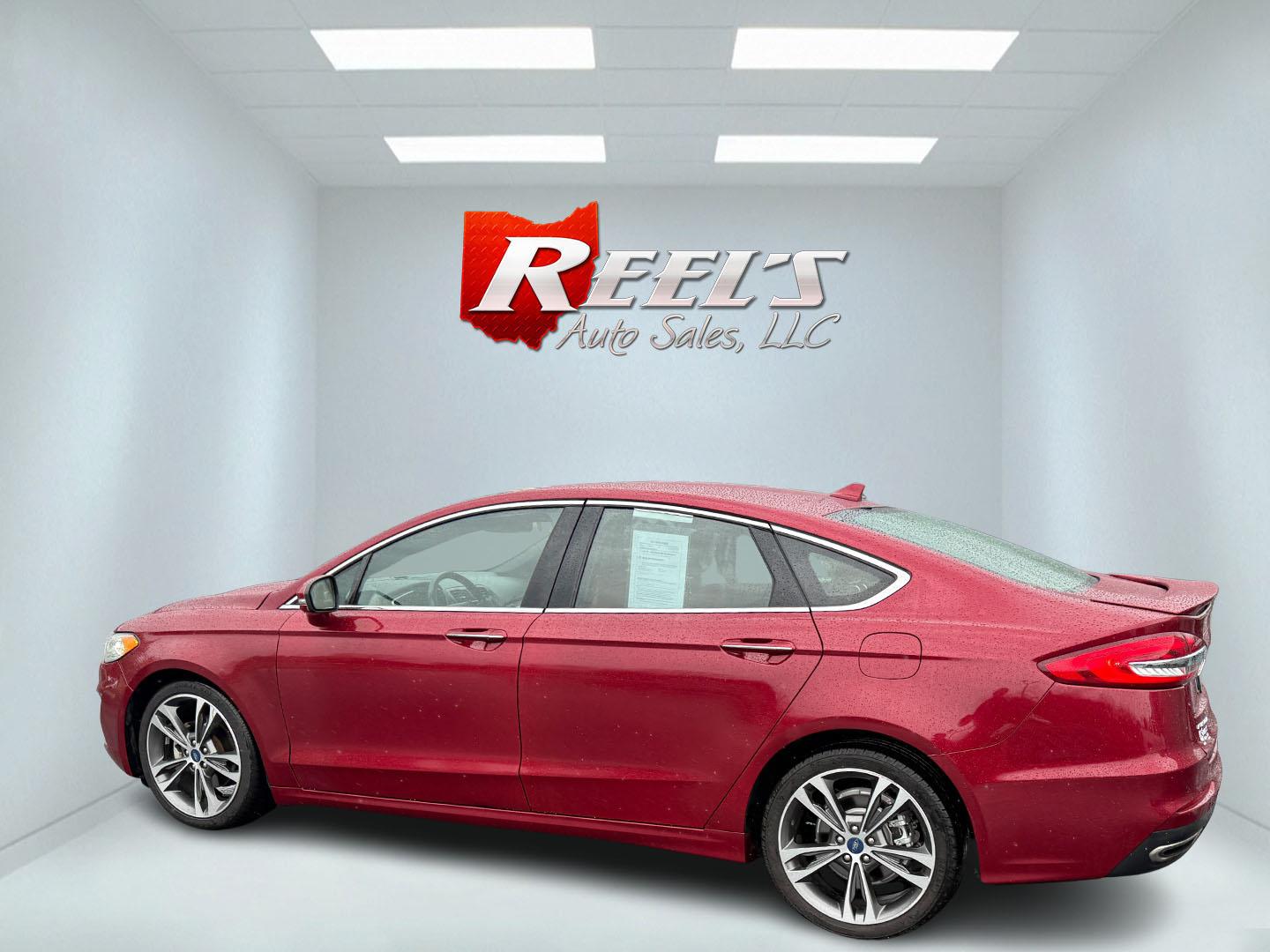 2019 Red /Brown Ford Fusion Titanium AWD (3FA6P0D91KR) with an 2.0L I4 DOHC 16V Turbo engine, 6A transmission, located at 11115 Chardon Rd. , Chardon, OH, 44024, (440) 214-9705, 41.580246, -81.241943 - This Ford Fusion is out of Florida and looks and drives like a dream. Its turbocharged 2.0L I4 engine, 6-speed automatic transmission, and all-wheel drive combine for confident handling. Inside, you'll find a luxurious leather interior with heated and cooled front seats, an advanced 12-speaker Sony - Photo#19