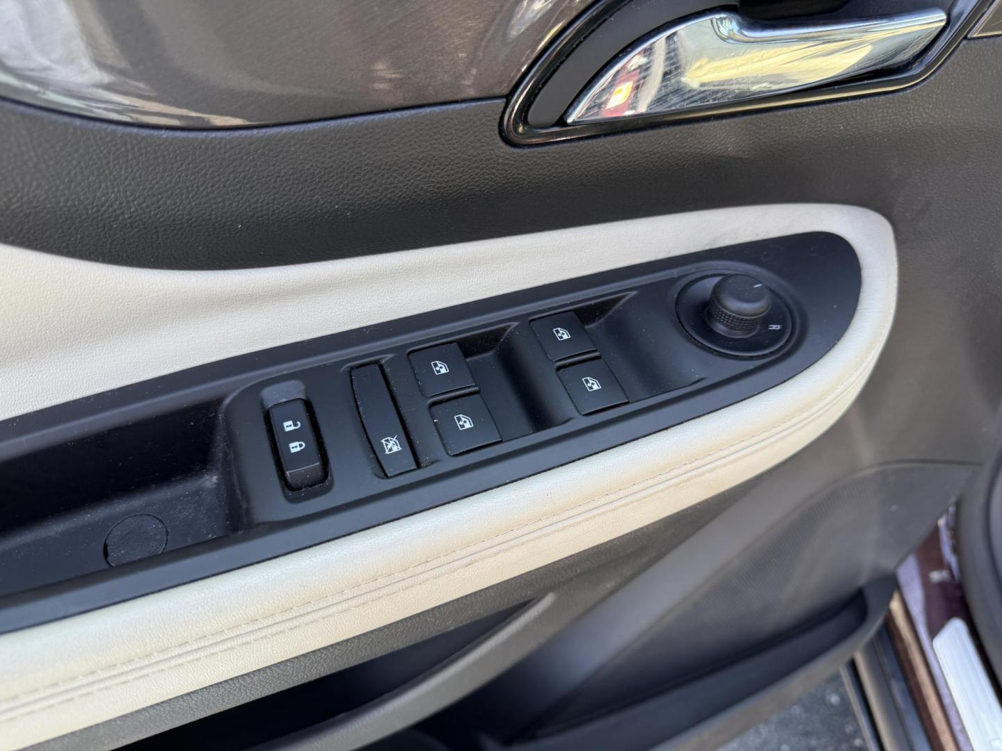 2017 Burgundy /Tan Buick Encore Essence AWD (KL4CJGSB0HB) with an 1.4L I4 DOHC 16V TURBO engine, 6A transmission, located at 11115 Chardon Rd. , Chardon, OH, 44024, (440) 214-9705, 41.580246, -81.241943 - This little Buick is a luxurious compact SUV. Its 1.4L turbocharged I4 engine paired with a 6-speed automatic transmission, delivering an impressive 30 MPG highway. It features a sophisticated 8.0" touch screen compatible with Apple CarPlay and Android Auto, along with convenient amenities such as r - Photo#6
