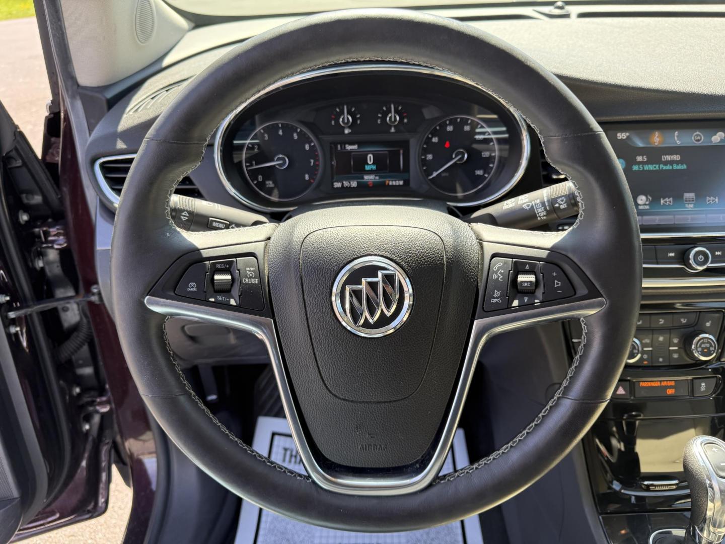 2017 Burgundy /Tan Buick Encore Essence AWD (KL4CJGSB0HB) with an 1.4L I4 DOHC 16V TURBO engine, 6A transmission, located at 11115 Chardon Rd. , Chardon, OH, 44024, (440) 214-9705, 41.580246, -81.241943 - This little Buick is a luxurious compact SUV. Its 1.4L turbocharged I4 engine paired with a 6-speed automatic transmission, delivering an impressive 30 MPG highway. It features a sophisticated 8.0" touch screen compatible with Apple CarPlay and Android Auto, along with convenient amenities such as r - Photo#19