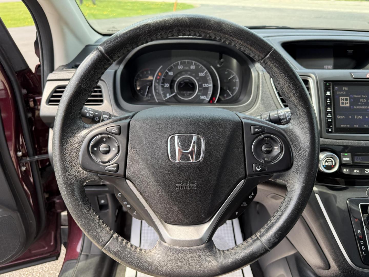 2016 Red /Gray Honda CR-V Touring AWD (5J6RM4H98GL) with an 2.4L I4 DOHC 16V engine, Automatic transmission, located at 11115 Chardon Rd. , Chardon, OH, 44024, (440) 214-9705, 41.580246, -81.241943 - This Honda CR-V has luxury car features with Honda's legendary reliability. With the 2.4L I4 EarthDreams VTEC engine offers a well-rounded combination of comfort, convenience, and advanced safety features, including a leather interior, heated front seats, a power driver’s seat with memory, sunroof - Photo#19