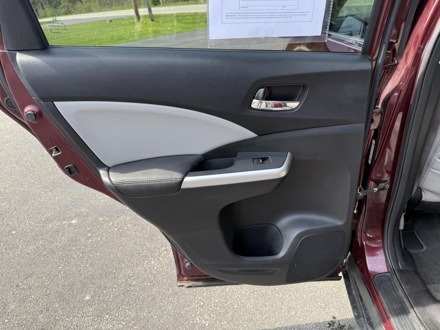 2016 Red /Gray Honda CR-V Touring AWD (5J6RM4H98GL) with an 2.4L I4 DOHC 16V engine, Automatic transmission, located at 11115 Chardon Rd. , Chardon, OH, 44024, (440) 214-9705, 41.580246, -81.241943 - This Honda CR-V has luxury car features with Honda's legendary reliability. With the 2.4L I4 EarthDreams VTEC engine offers a well-rounded combination of comfort, convenience, and advanced safety features, including a leather interior, heated front seats, a power driver’s seat with memory, sunroof - Photo#35
