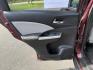 2016 Red /Gray Honda CR-V Touring AWD (5J6RM4H98GL) with an 2.4L I4 DOHC 16V engine, Automatic transmission, located at 11115 Chardon Rd. , Chardon, OH, 44024, (440) 214-9705, 41.580246, -81.241943 - This Honda CR-V has luxury car features with Honda's legendary reliability. With the 2.4L I4 EarthDreams VTEC engine offers a well-rounded combination of comfort, convenience, and advanced safety features, including a leather interior, heated front seats, a power driver’s seat with memory, sunroof - Photo#35