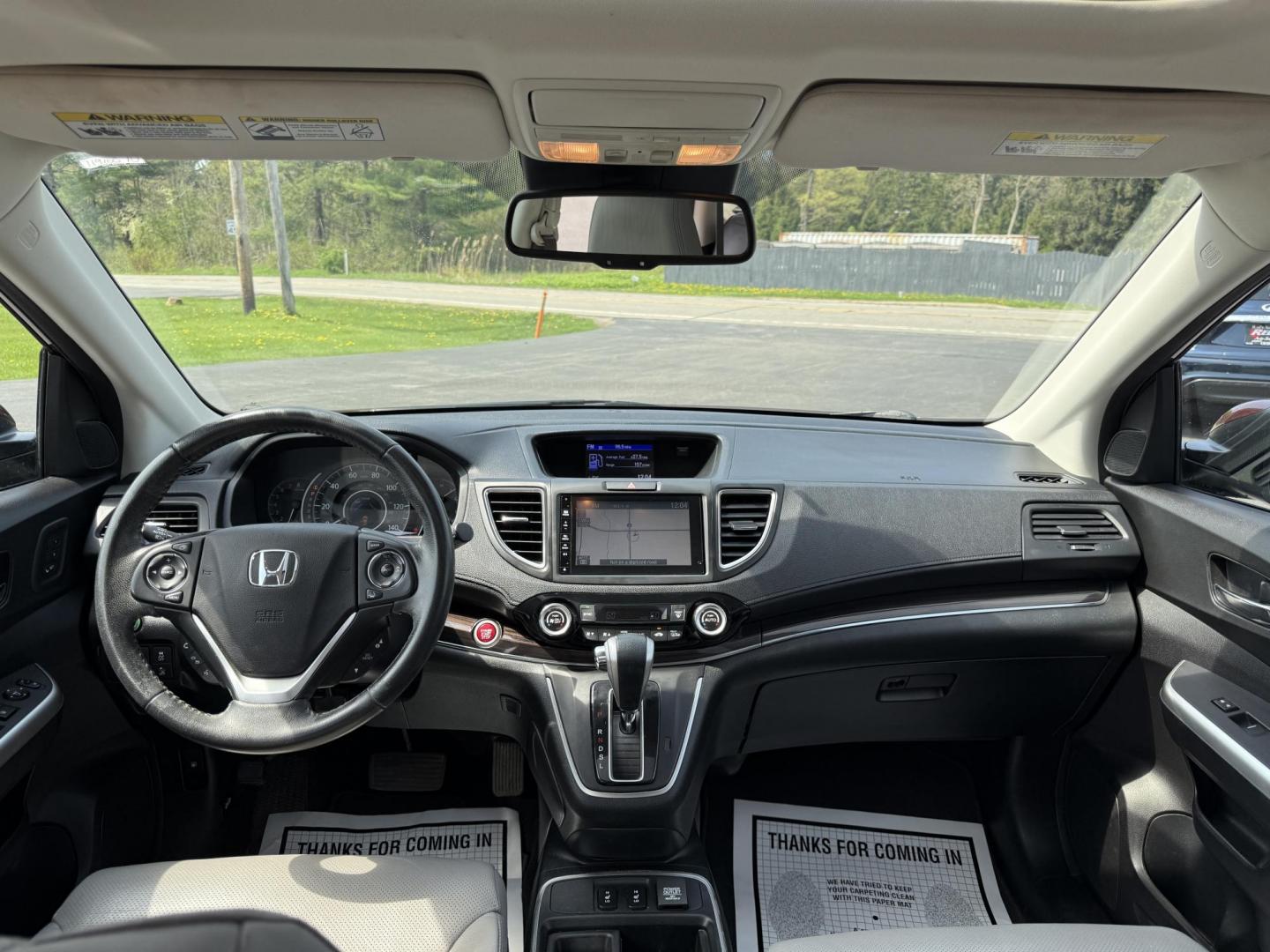 2016 Red /Gray Honda CR-V Touring AWD (5J6RM4H98GL) with an 2.4L I4 DOHC 16V engine, Automatic transmission, located at 11115 Chardon Rd. , Chardon, OH, 44024, (440) 214-9705, 41.580246, -81.241943 - This Honda CR-V has luxury car features with Honda's legendary reliability. With the 2.4L I4 EarthDreams VTEC engine offers a well-rounded combination of comfort, convenience, and advanced safety features, including a leather interior, heated front seats, a power driver’s seat with memory, sunroof - Photo#37