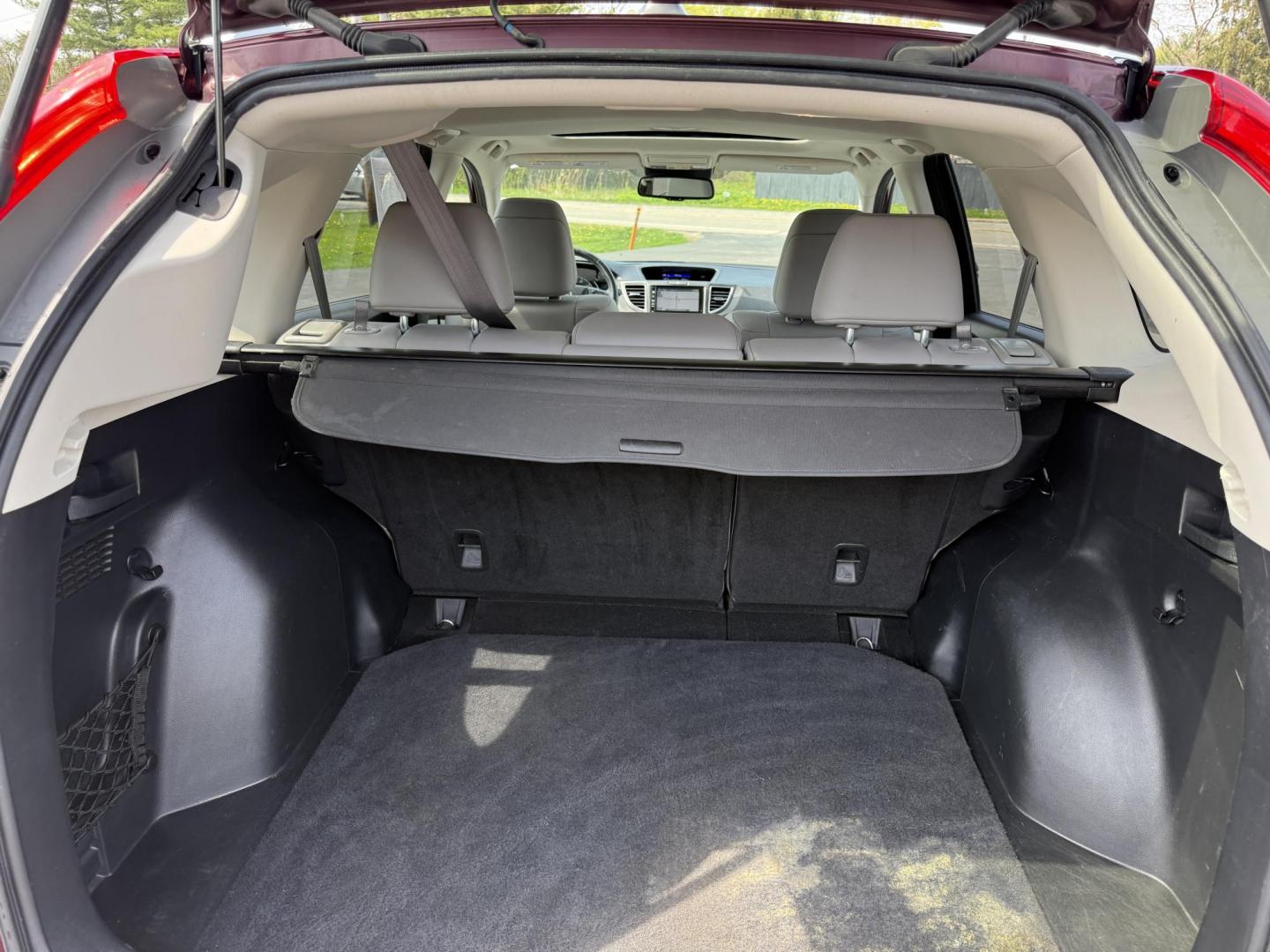 2016 Red /Gray Honda CR-V Touring AWD (5J6RM4H98GL) with an 2.4L I4 DOHC 16V engine, Automatic transmission, located at 11115 Chardon Rd. , Chardon, OH, 44024, (440) 214-9705, 41.580246, -81.241943 - This Honda CR-V has luxury car features with Honda's legendary reliability. With the 2.4L I4 EarthDreams VTEC engine offers a well-rounded combination of comfort, convenience, and advanced safety features, including a leather interior, heated front seats, a power driver’s seat with memory, sunroof - Photo#38