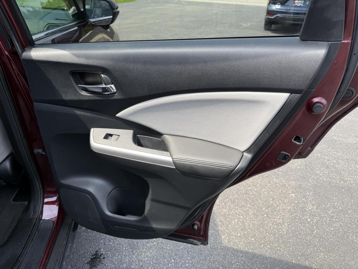 2016 Red /Gray Honda CR-V Touring AWD (5J6RM4H98GL) with an 2.4L I4 DOHC 16V engine, Automatic transmission, located at 11115 Chardon Rd. , Chardon, OH, 44024, (440) 214-9705, 41.580246, -81.241943 - This Honda CR-V has luxury car features with Honda's legendary reliability. With the 2.4L I4 EarthDreams VTEC engine offers a well-rounded combination of comfort, convenience, and advanced safety features, including a leather interior, heated front seats, a power driver’s seat with memory, sunroof - Photo#41