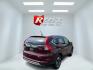 2016 Red /Gray Honda CR-V Touring AWD (5J6RM4H98GL) with an 2.4L I4 DOHC 16V engine, Automatic transmission, located at 11115 Chardon Rd. , Chardon, OH, 44024, (440) 214-9705, 41.580246, -81.241943 - This Honda CR-V has luxury car features with Honda's legendary reliability. With the 2.4L I4 EarthDreams VTEC engine offers a well-rounded combination of comfort, convenience, and advanced safety features, including a leather interior, heated front seats, a power driver’s seat with memory, sunroof - Photo#12