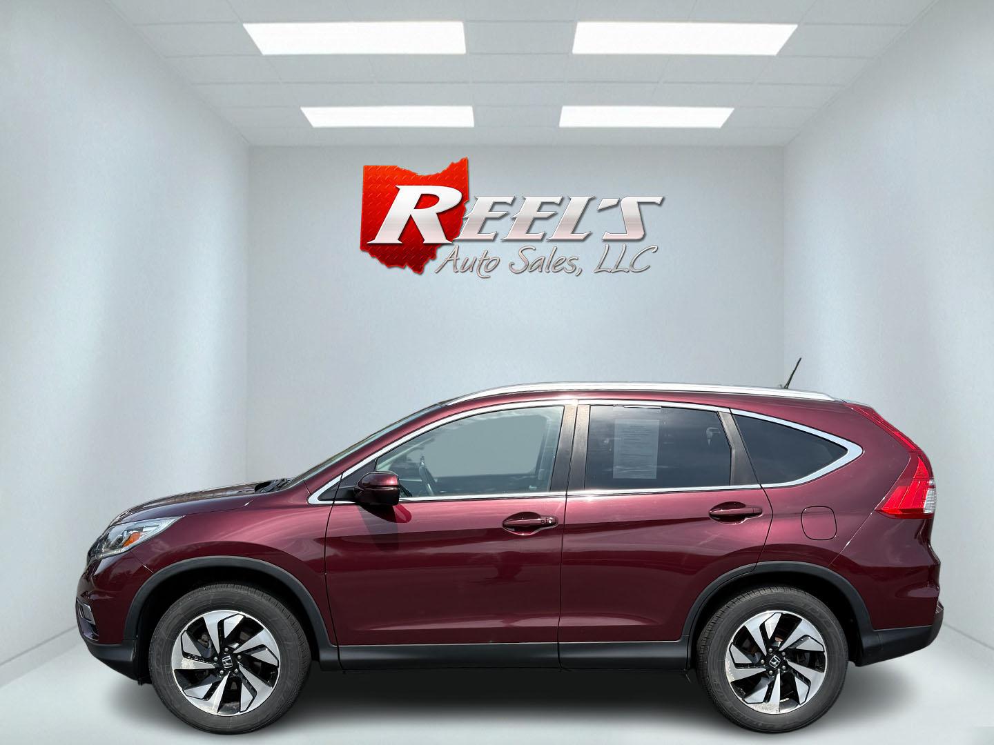 2016 Red /Gray Honda CR-V Touring AWD (5J6RM4H98GL) with an 2.4L I4 DOHC 16V engine, Automatic transmission, located at 11115 Chardon Rd. , Chardon, OH, 44024, (440) 214-9705, 41.580246, -81.241943 - This Honda CR-V has luxury car features with Honda's legendary reliability. With the 2.4L I4 EarthDreams VTEC engine offers a well-rounded combination of comfort, convenience, and advanced safety features, including a leather interior, heated front seats, a power driver’s seat with memory, sunroof - Photo#49