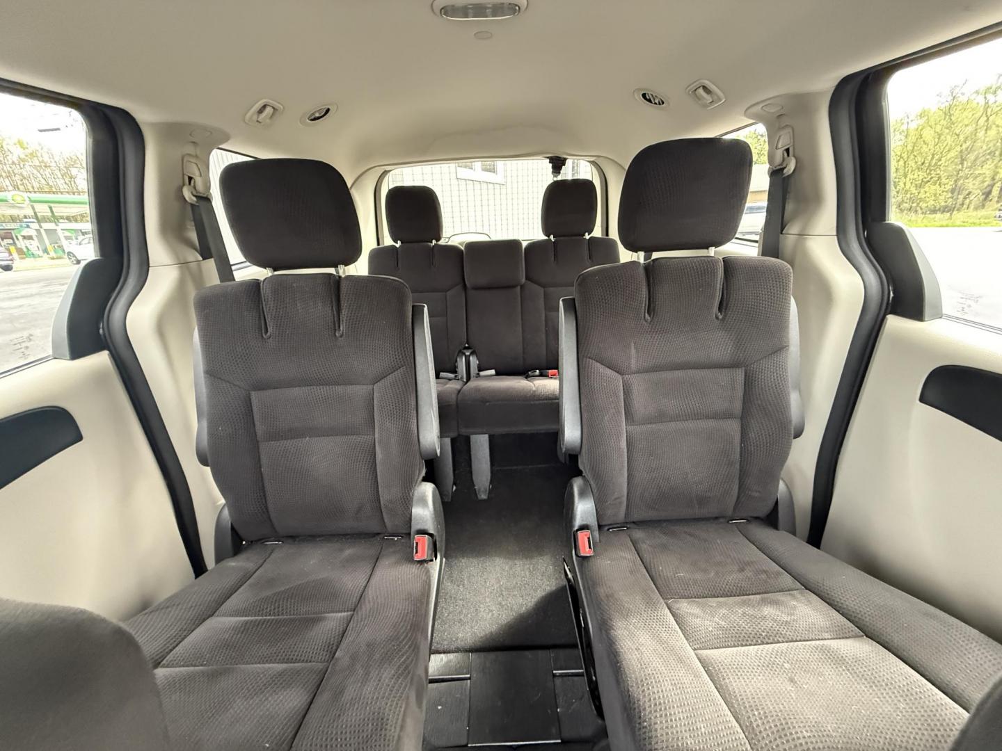 2014 Black /Black Dodge Grand Caravan SE (2C4RDGBG5ER) with an 3.6L V6 DOHC 24V FFV engine, 6-Speed Automatic transmission, located at 11115 Chardon Rd. , Chardon, OH, 44024, (440) 214-9705, 41.580246, -81.241943 - This One Owner 2014 Dodge Grand Caravan is ready for any adventure your family needs. Equipped with a 3.6L Pentastar V6 engine and a 6-speed automatic transmission, offering reliable performance and flex-fuel capability. It features practical amenities such as STOW 'N GO' seating for flexible cargo - Photo#27