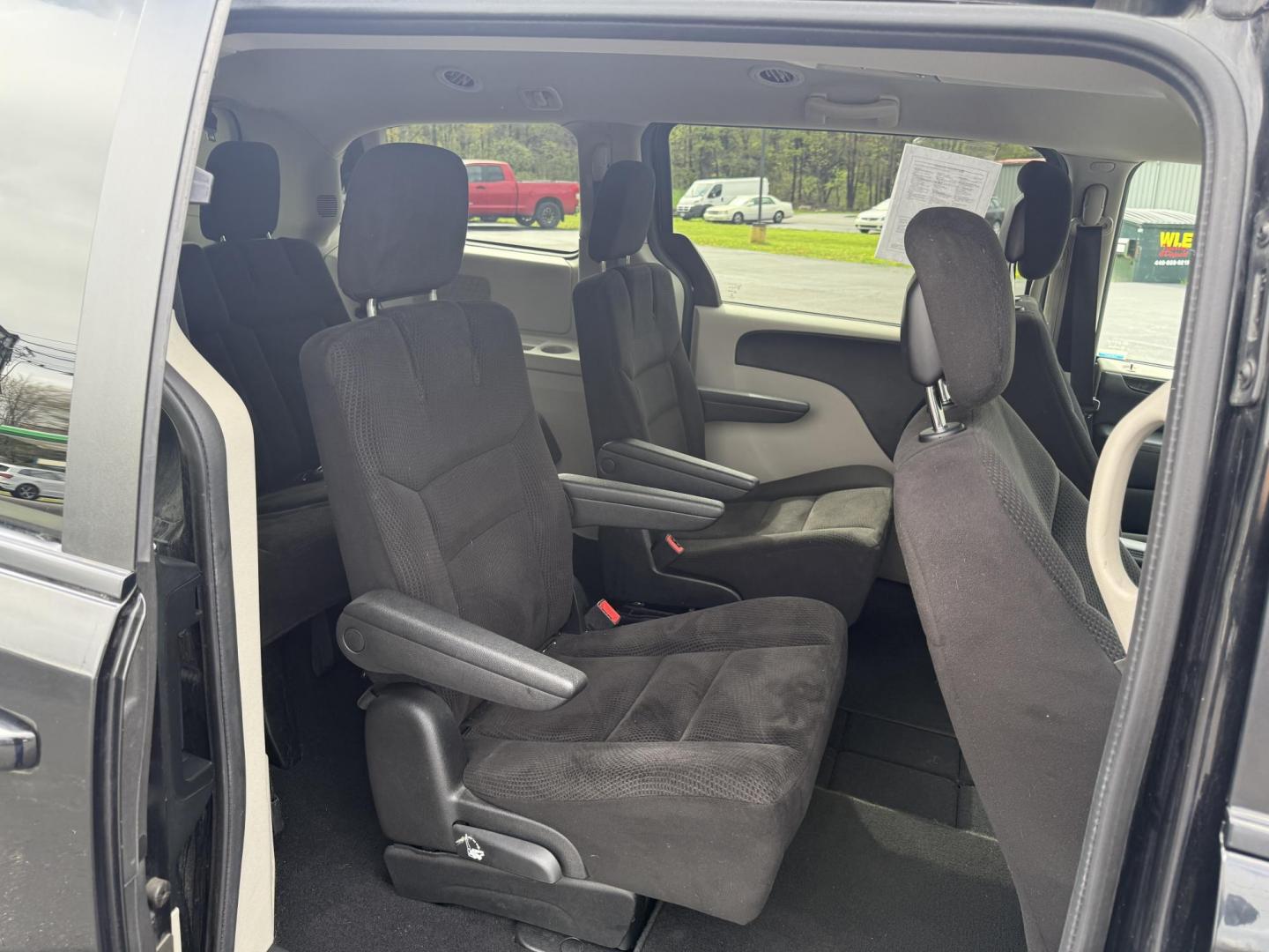 2014 Black /Black Dodge Grand Caravan SE (2C4RDGBG5ER) with an 3.6L V6 DOHC 24V FFV engine, 6-Speed Automatic transmission, located at 11115 Chardon Rd. , Chardon, OH, 44024, (440) 214-9705, 41.580246, -81.241943 - This One Owner 2014 Dodge Grand Caravan is ready for any adventure your family needs. Equipped with a 3.6L Pentastar V6 engine and a 6-speed automatic transmission, offering reliable performance and flex-fuel capability. It features practical amenities such as STOW 'N GO' seating for flexible cargo - Photo#34