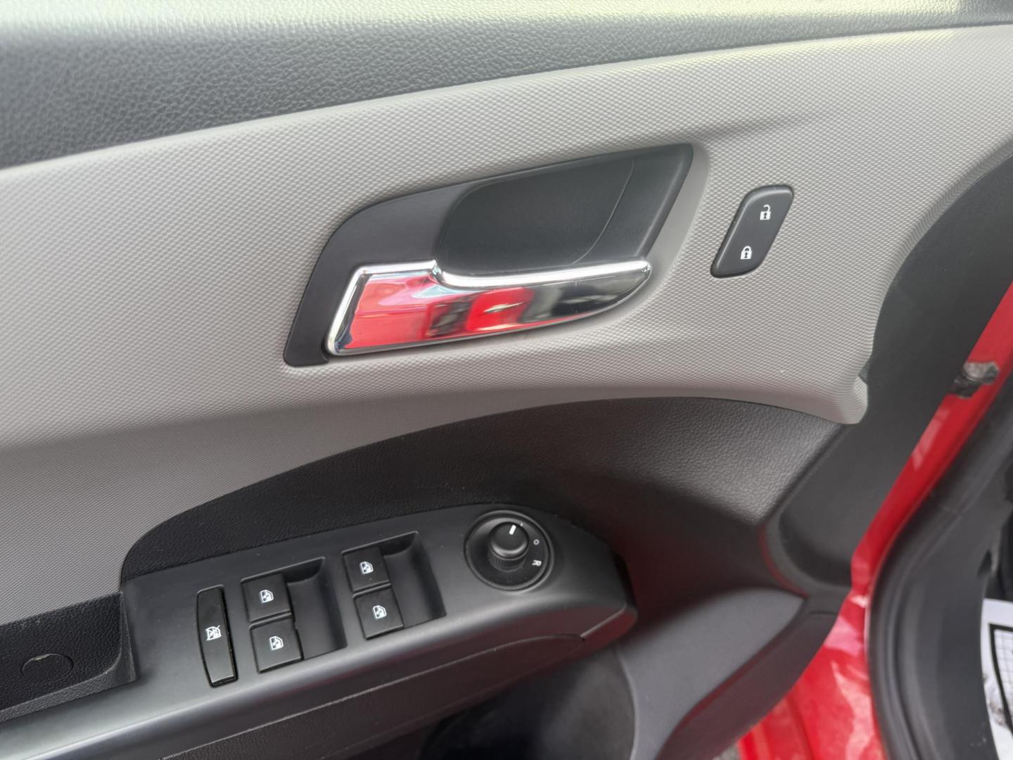 2015 Red /Black Chevrolet Sonic LT Auto Sedan (1G1JC5SH8F4) with an 1.8L I4 DOHC 24V engine, 6-Speed Automatic transmission, located at 11115 Chardon Rd. , Chardon, OH, 44024, (440) 214-9705, 41.580246, -81.241943 - FRESH TRADE IN ALERT ---- This 2015 Chevrolet Sonic LT Sedan with a 1.8L I4 EcoTec engine and 6-speed automatic transmission offers a blend of efficiency and convenience, achieving up to 34 MPG on the highway. Standard features include daytime running lights, dusk-sensing headlights for enhanced sa - Photo#17