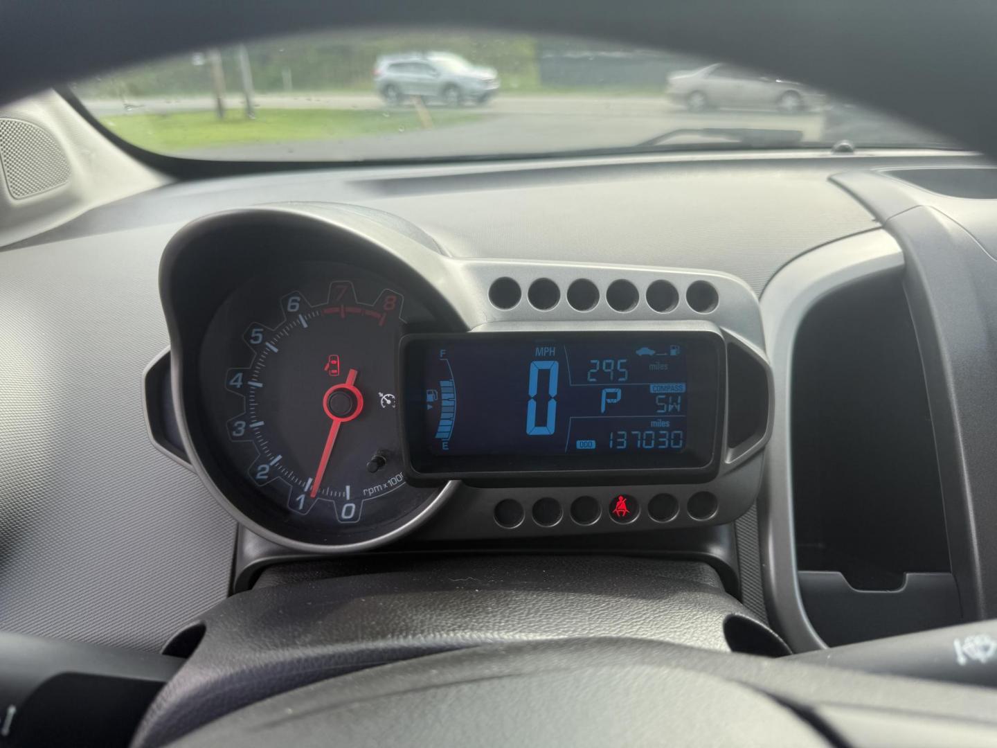 2015 Red /Black Chevrolet Sonic LT Auto Sedan (1G1JC5SH8F4) with an 1.8L I4 DOHC 24V engine, 6-Speed Automatic transmission, located at 11115 Chardon Rd. , Chardon, OH, 44024, (440) 214-9705, 41.580246, -81.241943 - FRESH TRADE IN ALERT ---- This 2015 Chevrolet Sonic LT Sedan with a 1.8L I4 EcoTec engine and 6-speed automatic transmission offers a blend of efficiency and convenience, achieving up to 34 MPG on the highway. Standard features include daytime running lights, dusk-sensing headlights for enhanced sa - Photo#20