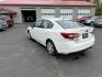 2017 White /Gray Subaru Impreza 2.0i 4-Door (4S3GKAA60H3) with an 2.0L H4 DOHC 16V engine, Automatic transmission, located at 547 E. Main St., Orwell, OH, 44076, (440) 437-5893, 41.535435, -80.847855 - This little 2017 Subaru Imprezza is a modern and fuel efficient sedan. Equipped with a 2.0-liter H4 engine and Subaru’s Symmetrical All-Wheel Drive system, offering confident handling and stability. It boasts impressive fuel efficiency, achieving up to 38 MPG on the highway. Standard features incl - Photo#9