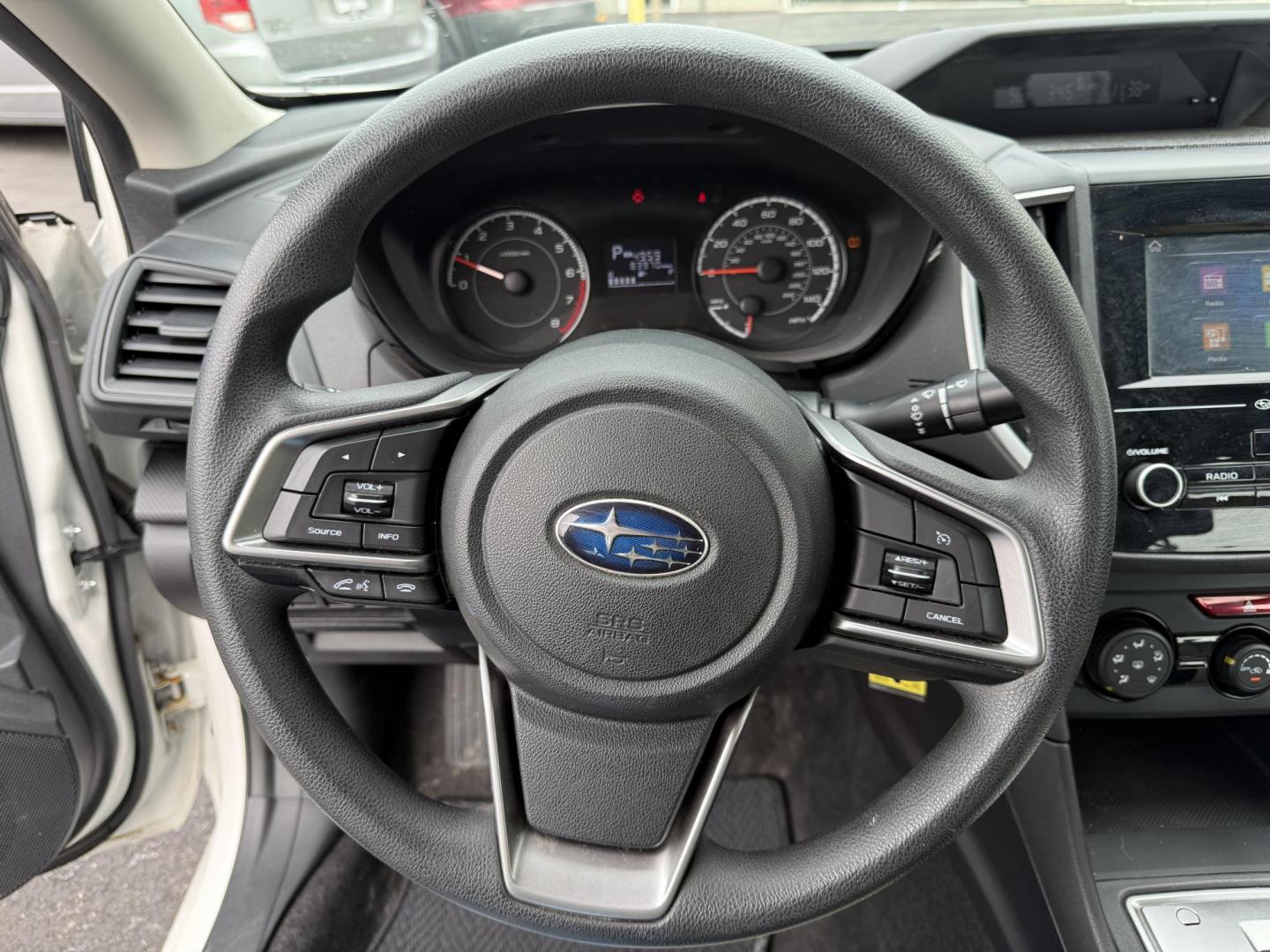 2017 White /Gray Subaru Impreza 2.0i 4-Door (4S3GKAA60H3) with an 2.0L H4 DOHC 16V engine, Automatic transmission, located at 547 E. Main St., Orwell, OH, 44076, (440) 437-5893, 41.535435, -80.847855 - This little 2017 Subaru Imprezza is a modern and fuel efficient sedan. Equipped with a 2.0-liter H4 engine and Subaru’s Symmetrical All-Wheel Drive system, offering confident handling and stability. It boasts impressive fuel efficiency, achieving up to 38 MPG on the highway. Standard features incl - Photo#21