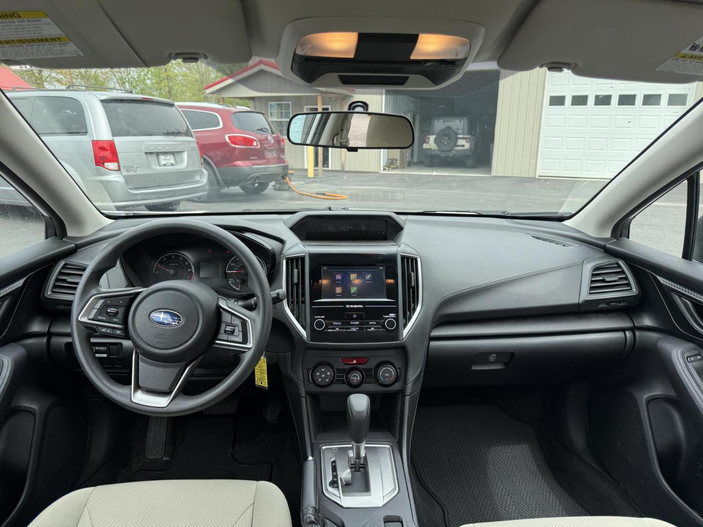 2017 White /Gray Subaru Impreza 2.0i 4-Door (4S3GKAA60H3) with an 2.0L H4 DOHC 16V engine, Automatic transmission, located at 547 E. Main St., Orwell, OH, 44076, (440) 437-5893, 41.535435, -80.847855 - This little 2017 Subaru Imprezza is a modern and fuel efficient sedan. Equipped with a 2.0-liter H4 engine and Subaru’s Symmetrical All-Wheel Drive system, offering confident handling and stability. It boasts impressive fuel efficiency, achieving up to 38 MPG on the highway. Standard features incl - Photo#28