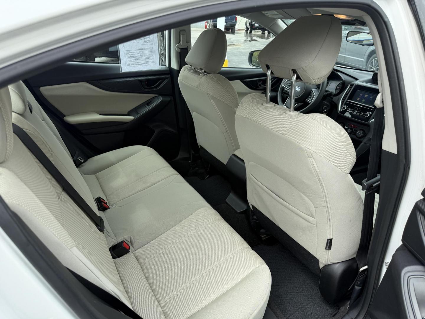 2017 White /Gray Subaru Impreza 2.0i 4-Door (4S3GKAA60H3) with an 2.0L H4 DOHC 16V engine, Automatic transmission, located at 547 E. Main St., Orwell, OH, 44076, (440) 437-5893, 41.535435, -80.847855 - This little 2017 Subaru Imprezza is a modern and fuel efficient sedan. Equipped with a 2.0-liter H4 engine and Subaru’s Symmetrical All-Wheel Drive system, offering confident handling and stability. It boasts impressive fuel efficiency, achieving up to 38 MPG on the highway. Standard features incl - Photo#31