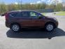 2015 Red /Black Honda CR-V EX-L 4WD (2HKRM4H73FH) with an 2.4L I4 DOHC 16V engine, Automatic transmission, located at 11115 Chardon Rd. , Chardon, OH, 44024, (440) 214-9705, 41.580246, -81.241943 - This One Owner 2015 Honda CR-V EX-L AWD has luxury, reliability and, fuel efficiency. Powered by Honda's incredible 2.4 I4 Engine and CVT (Continuously Variable Transmission) it achieves up to 32 MPG Highway while still have all weather capability due to it's all wheel drive system. With a leather i - Photo#4